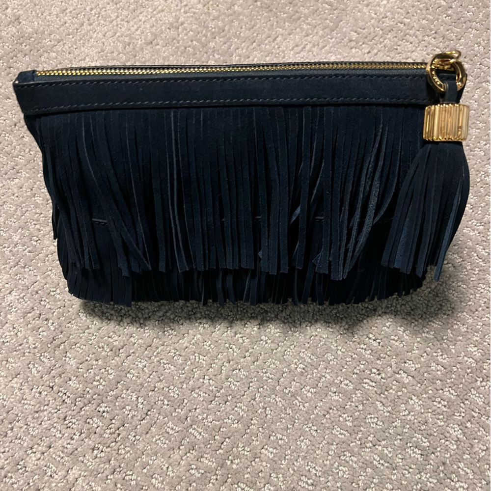 India hicks clutch, brand new condition